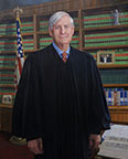 Hon Dennis Cavanaugh